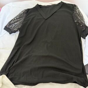 Elegant Black Top with Sequin Sleeves